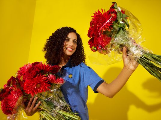Verkäuferin mit Blumen